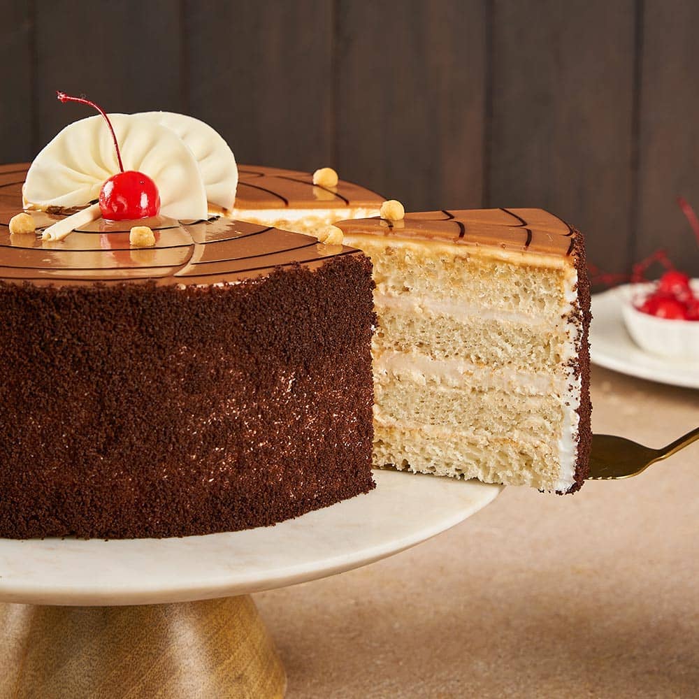 Sliced View of Round Shape Butterscotch Cake