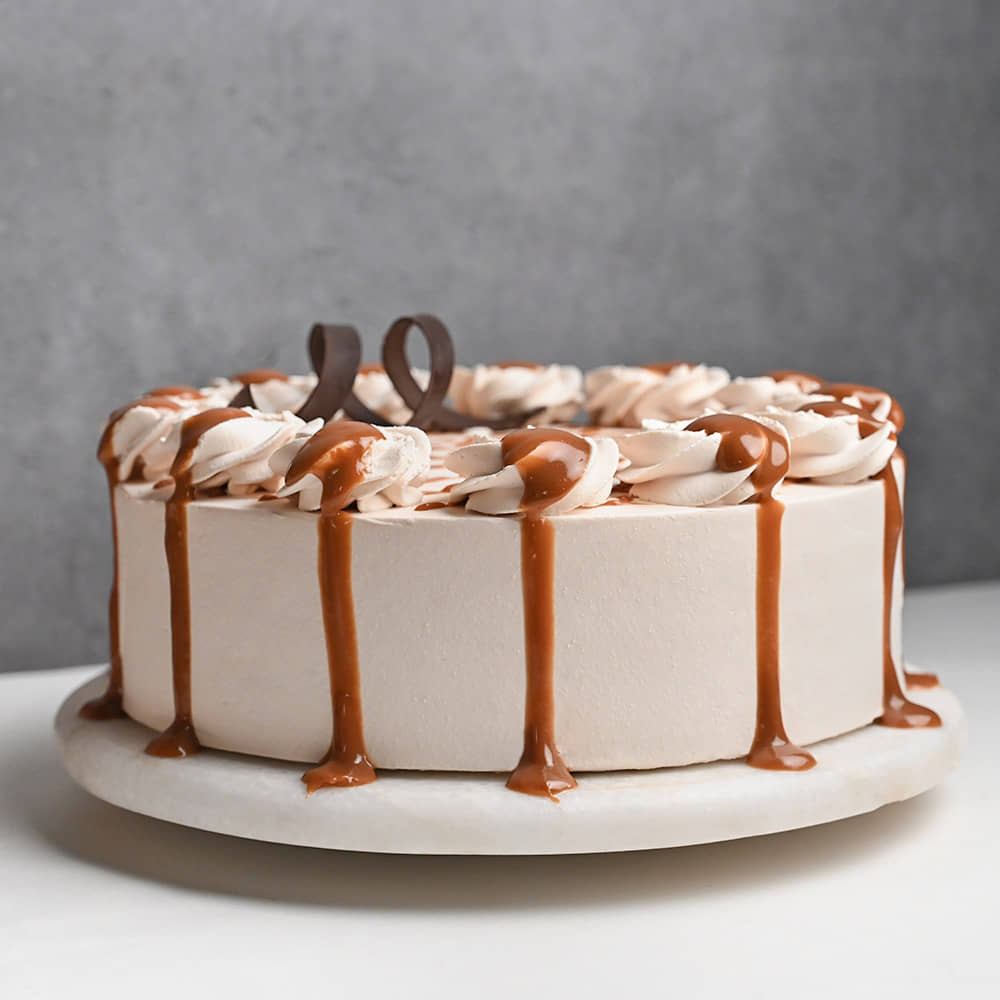 Dripping Caramel Cake
