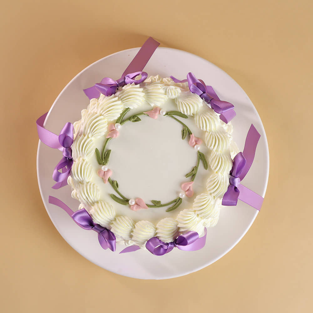 Top View of Floral Swirls Ribbon Cake