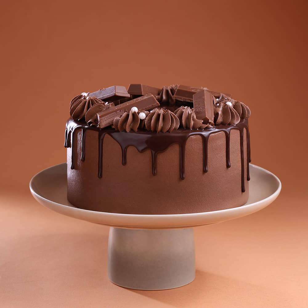 Side View of KitKat Swirls Drip Cake