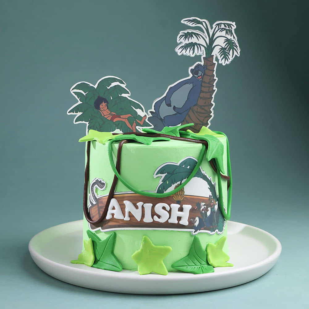 Side View of Magical Jungle Book Theme Cake