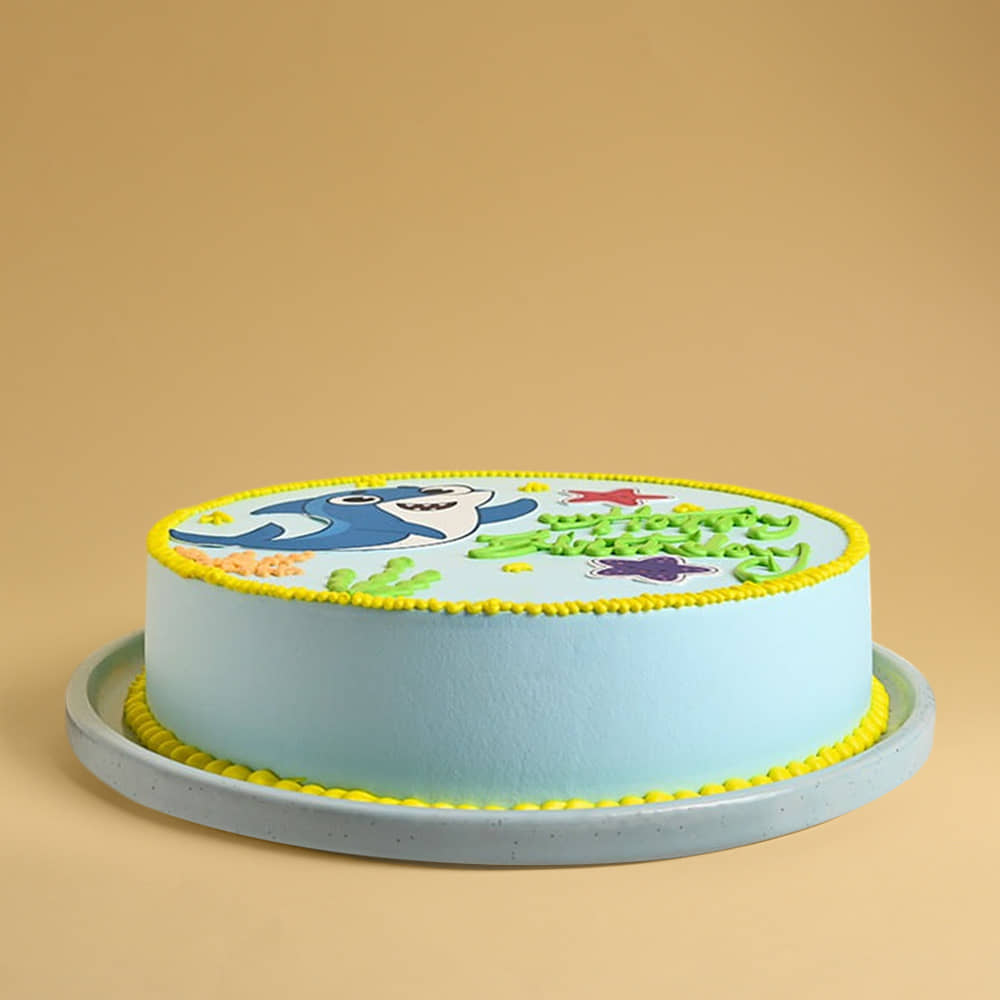 Front View of Ocean Adventure Baby Shark Cake