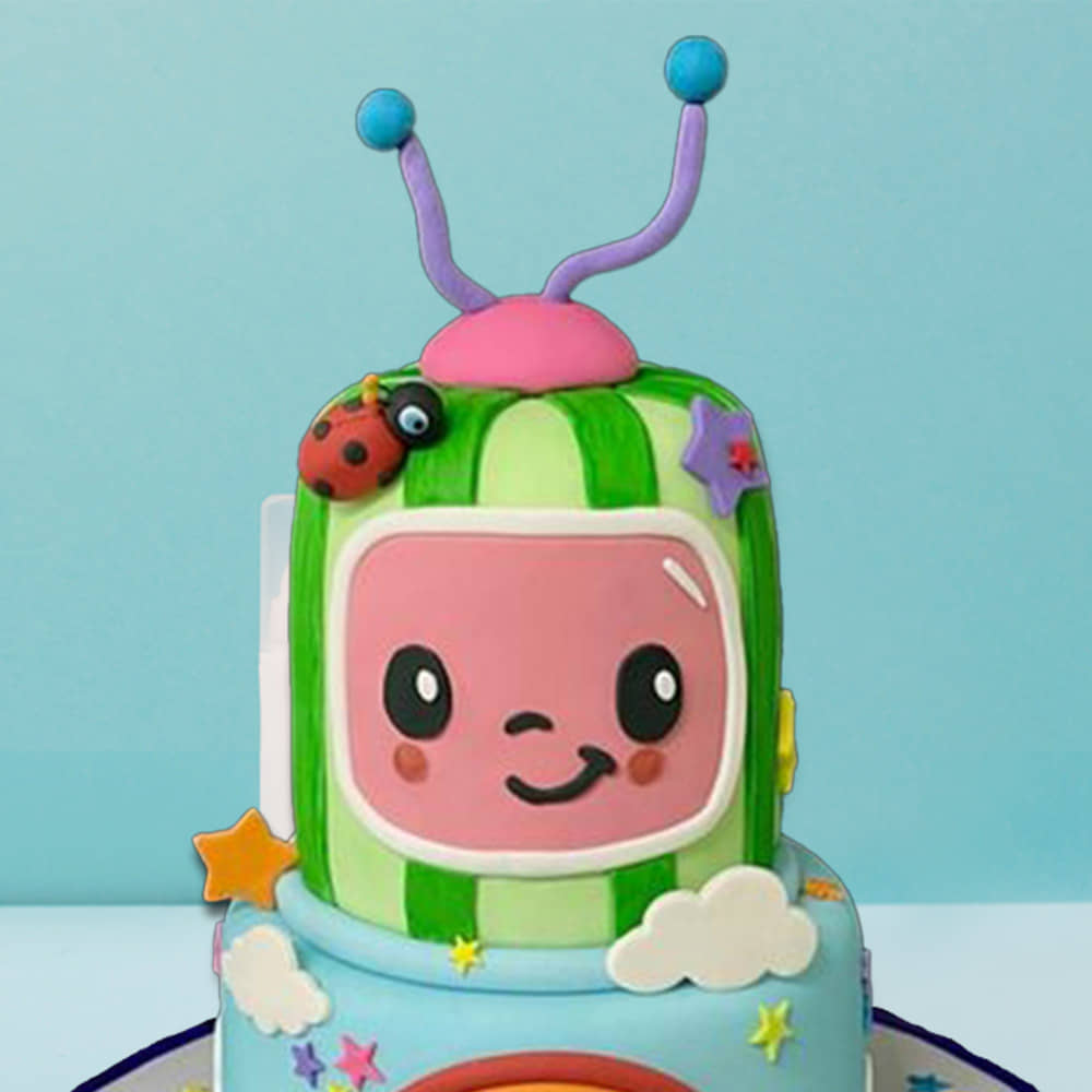 Zoomed View of Two Tier Rainbow And Cocomelon Cake