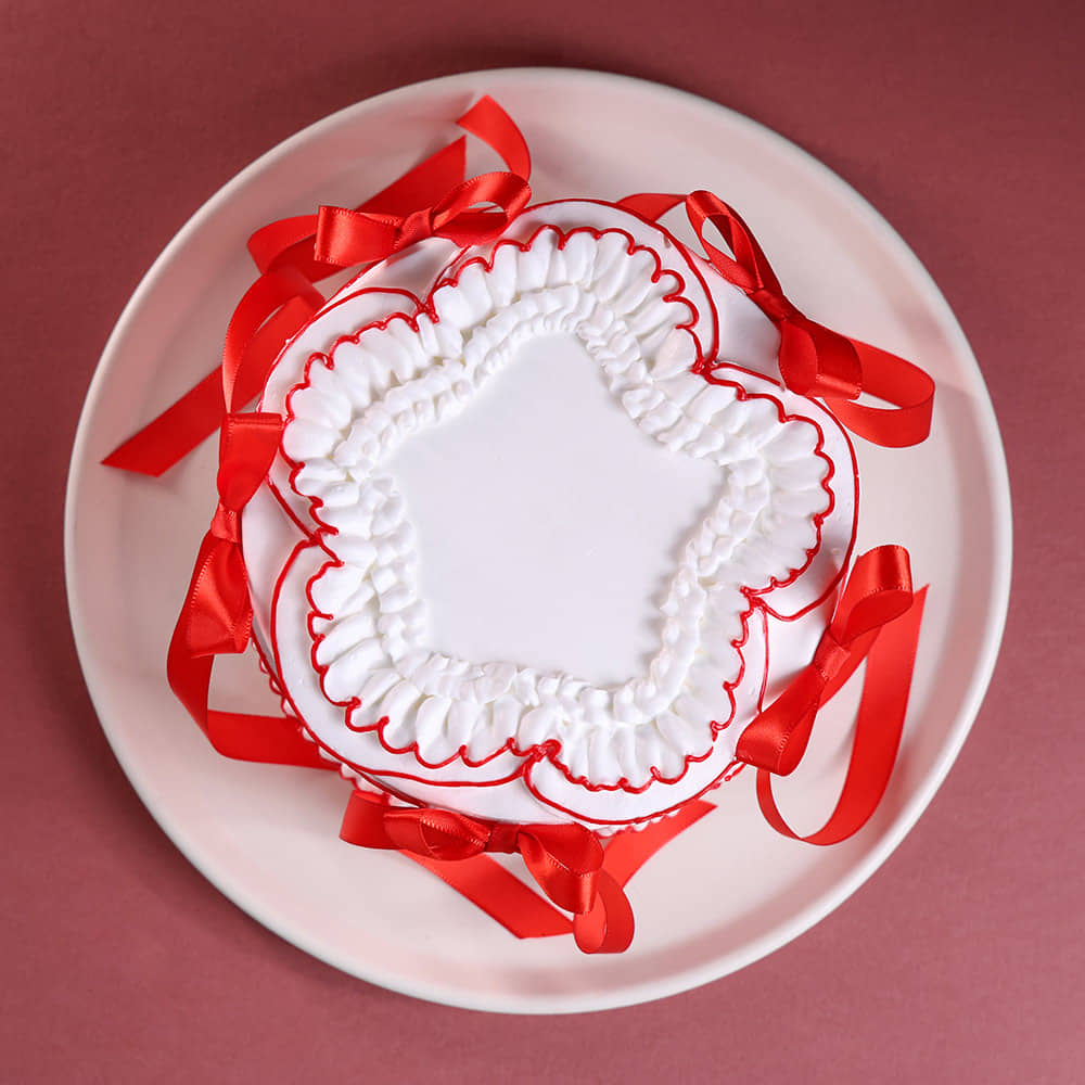 Top View of Red Hearts N Ribbon Cake