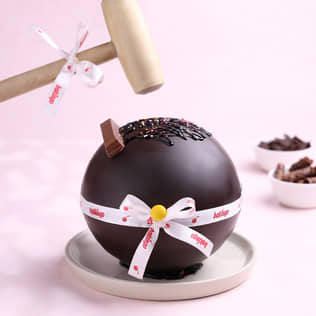 Front View of Ferrero Rocher and Kitkat Pinata Ball Cake