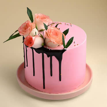 Front View of Pink Rose Cake with Romantic Rose Swirls